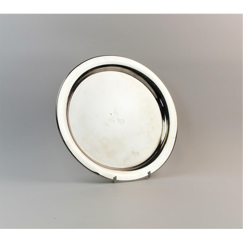 57 - An American silver salver, Gorham, Rhode Island 1927, of circular plain polished form, with monogram... 