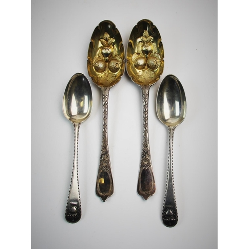 73 - A pair of silver spoons, maker mark 'JJ', London 1739, with urn cast terminals and beaded rims, each... 