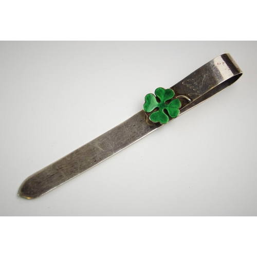 76 - A German silver and enamelled bookmark, engraved 'Cissy' and dated '31.8.04', decorated with a guill... 