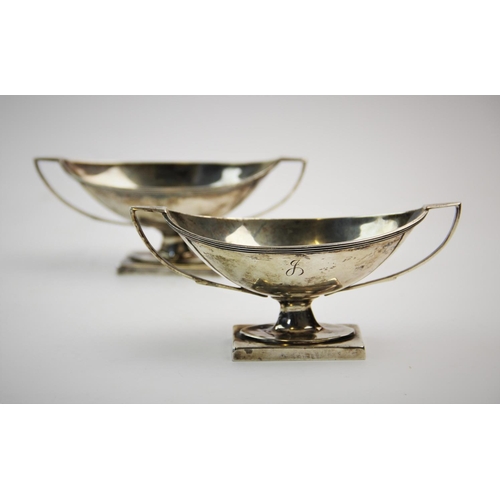 77 - A pair of Victorian silver salts, Nathan & Hayes, Birmingham 1892, each of navette shape, with reede... 