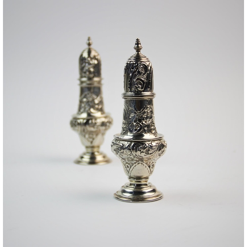 8 - A pair of Victorian silver sugar casters, William Aitken, Chester 1900, each of baluster form, decor... 