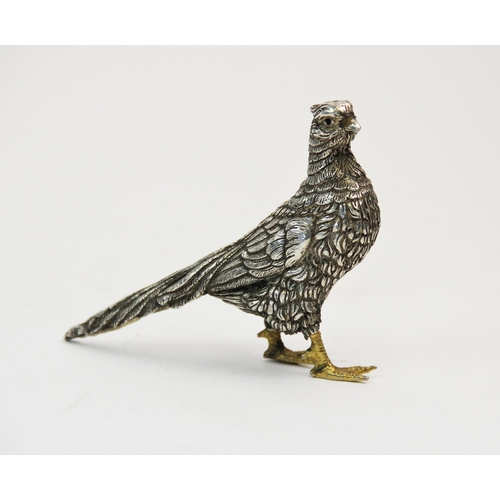 80 - A white metal pheasant, the feather body decorated with striated details and gilt feet, stamped '925... 