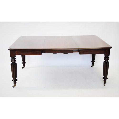 871 - A Victorian mahogany extending dining table, the rectangular moulded top with rounded corners, above... 