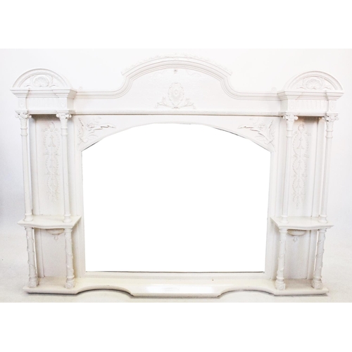 886 - An Edwardian painted overmantle mirror, with central arched pediment above the arched bevelled mirro... 