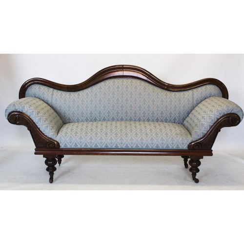 897 - A Victorian mahogany framed twin scroll end settee, the serpentine back above padded scroll arms and... 