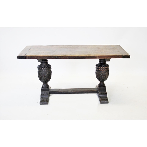 900 - A 17th century style refectory table, early 20th century, the rectangular cleated slab top raised up... 