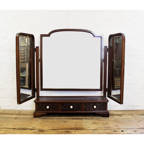 908 - A 1920's Chinese Chippendale revival mahogany triple dressing table mirror, the three bevelled mirro... 