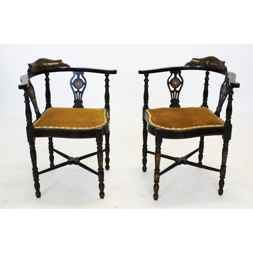 925 - A pair of Edwardian inlaid corner chairs, the curved top rail raised upon two pierced inlaid splats ... 