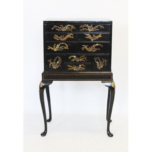 904 - An early 20th century Japanned specimen chest on stand, the rectangular cabinet with an arrangement ... 