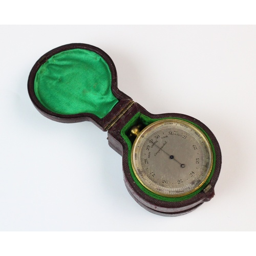 130 - A 19th century gilt metal cased pocket barometer, within fitted case