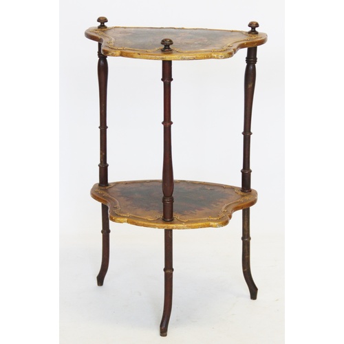 923 - An Italian style two tier occasional table, 20th century, the upper tier adorned with a courting cou... 