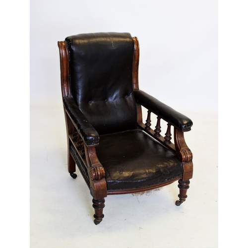 889 - A William IV mahogany and leather drawing room chair, with a button padded back above padded arms ra... 