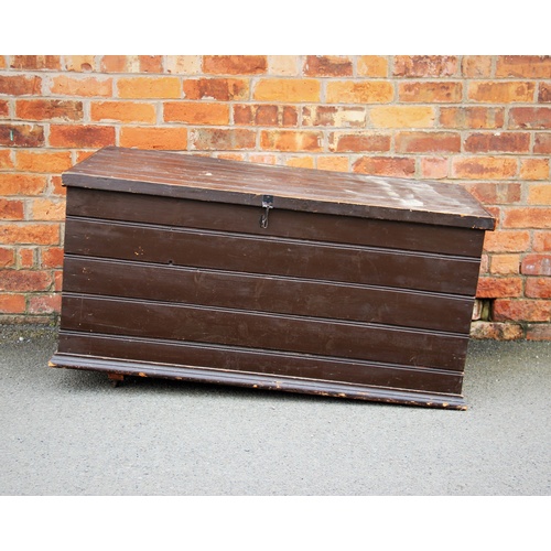 920 - An early 20th century painted pine slatted trunk, applied with side swing handles and moulded plinth... 