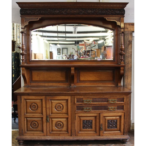 878 - A late 19th/ early 20th century oak and pollard oak mirror back sideboard by E Goodall & Co, Manches... 