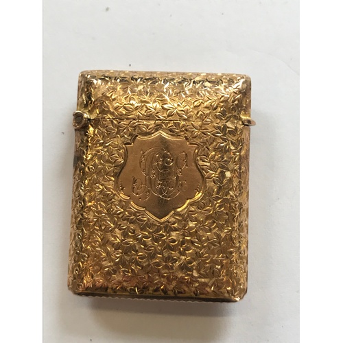 28 - A Victorian 9ct gold vesta case, Minshull & Latimer, Birmingham 1900, the rectangular form body deco... 