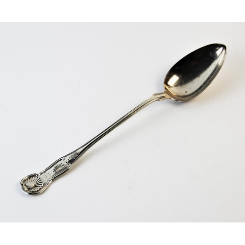 129 - An American white metal Kings pattern basting spoon, stamped 'M.W Galt & Bro', monogrammed 'AM', 33c... 