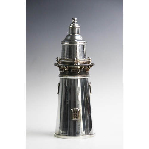 140 - A 20th century American silver plated lighthouse cocktail shaker, bearing mark for E.G. Webster, the... 