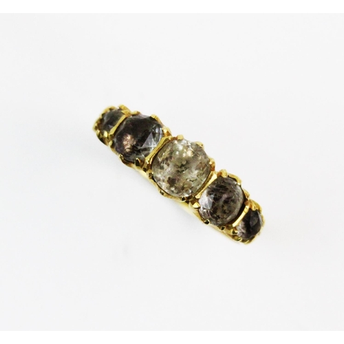 167 - A Victorian 18ct gold stone set ring, comprising five graduated mine cut paste stones, claw set in 1... 