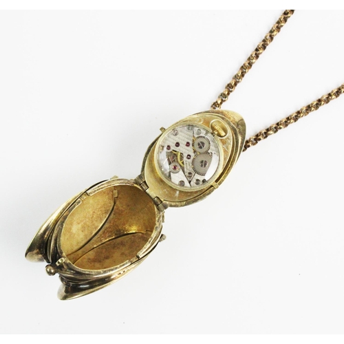 180 - A silver gilt watch pendant on chain, designed as a hanging fruit with three hinged locket 'leaf' si... 