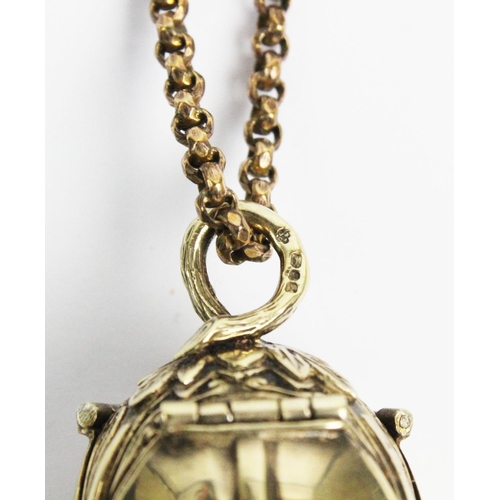 180 - A silver gilt watch pendant on chain, designed as a hanging fruit with three hinged locket 'leaf' si... 