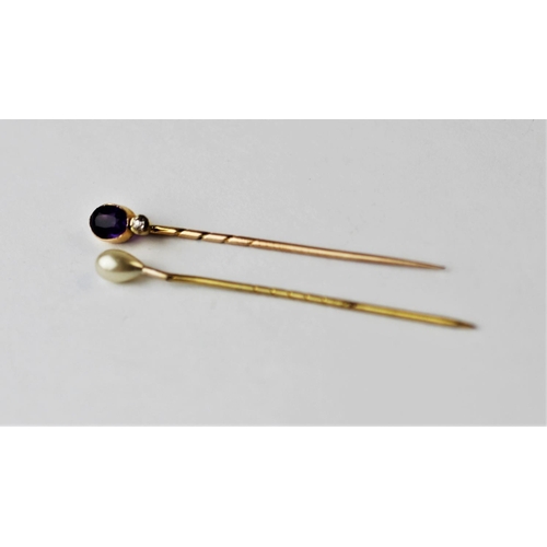 206 - An amethyst and diamond set stick pin, an untested pearl set stick pin and a turquoise set stick pin... 