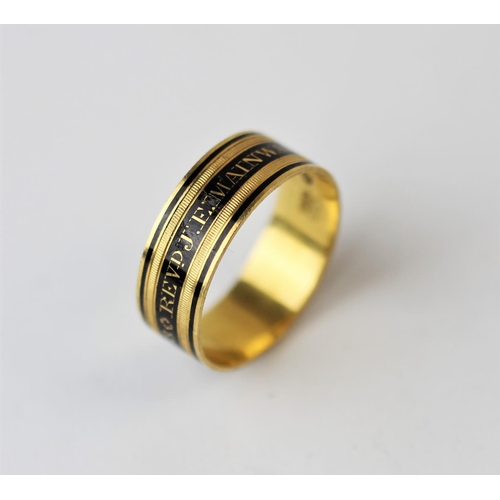 214 - A George III mourning ring, 'WH EH' London 1808, the yellow gold ring with black enamel 'Revd J E Ma... 