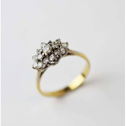 217 - A diamond set cluster ring, the fifteen brilliant cut diamonds, all within white metal claw setting,... 