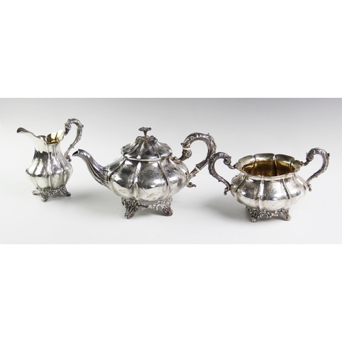 24 - An early Victorian silver three piece tea service, John Wellby London 1840 and 1841, each piece of c... 