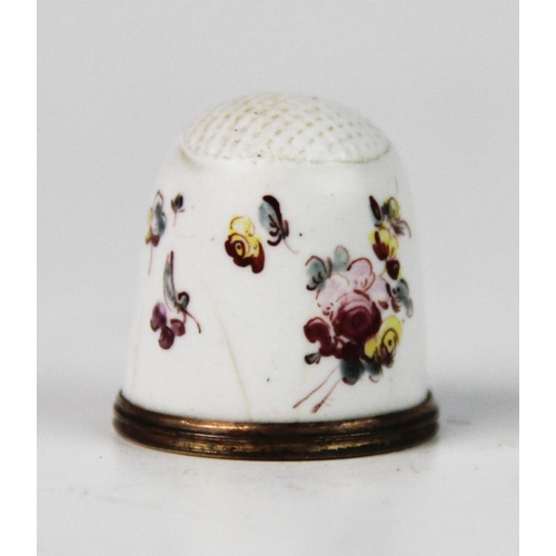 254 - A late 18th century Bilston enamel thimble, of typical form, the white ground decorated with polychr... 