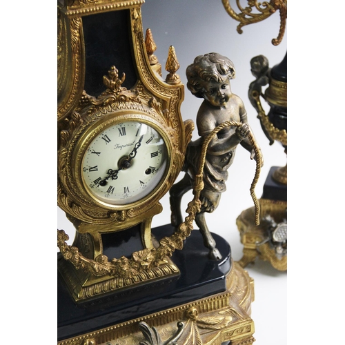 367 - An Italian Brevettato Imperial gilt metal clock garniture, 20th century, the clock adorned with cast... 