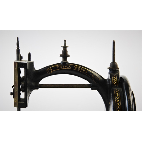 392 - A late 19th century Prima Donna Lockstitch sewing machine, circa 1870, by Wright and Mann, the C fra... 