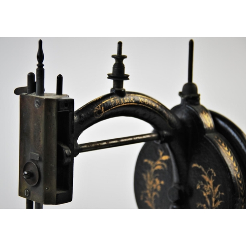 392 - A late 19th century Prima Donna Lockstitch sewing machine, circa 1870, by Wright and Mann, the C fra... 