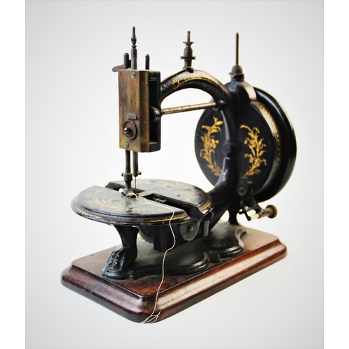 392 - A late 19th century Prima Donna Lockstitch sewing machine, circa 1870, by Wright and Mann, the C fra... 