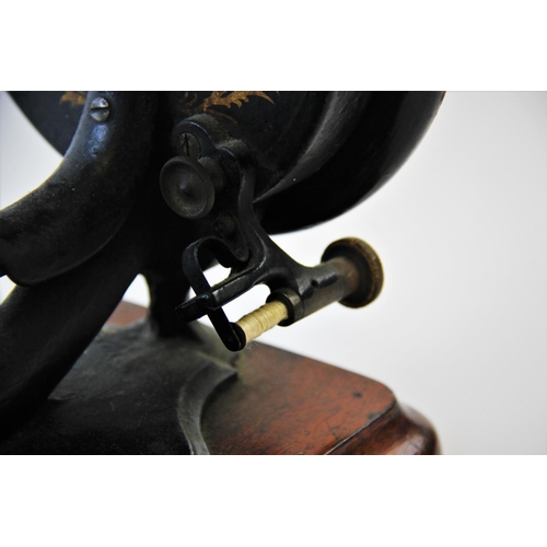 392 - A late 19th century Prima Donna Lockstitch sewing machine, circa 1870, by Wright and Mann, the C fra... 