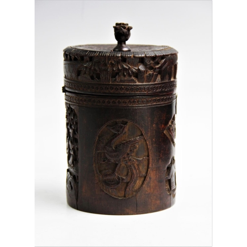 435 - A Chinese carved bamboo tea caddy, Canton, 19th century, of cylindrical form with hinged cover engra... 