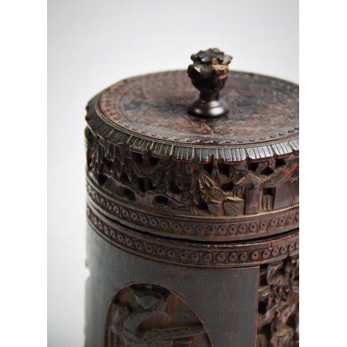 435 - A Chinese carved bamboo tea caddy, Canton, 19th century, of cylindrical form with hinged cover engra... 