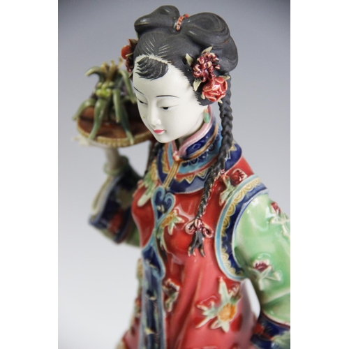 442 - A Franklin Mint 'Yoshiko' Manabu Saito figure, and another titled 'Mariko' with two further figures ... 