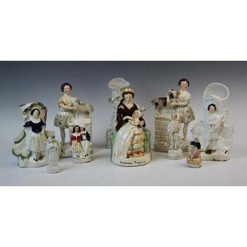 457 - A group of Staffordshire flatback figures, 19th century and later, to include: a portrait figure of ... 