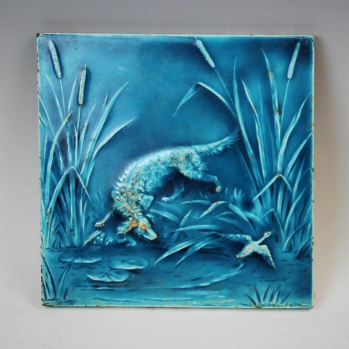 461 - Two Minton Hollins & Co turquoise glazed tiles of hunting interest, one depicting a pointer dog in a... 