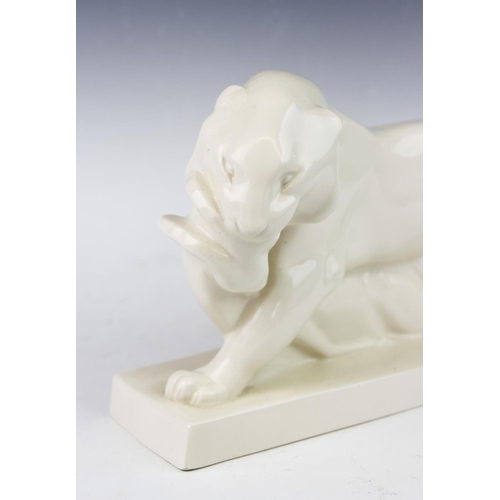 465 - A John Skeaping for Wedgwood Art Deco style animal group, 'The Kill', modelled as a lioness dragging... 