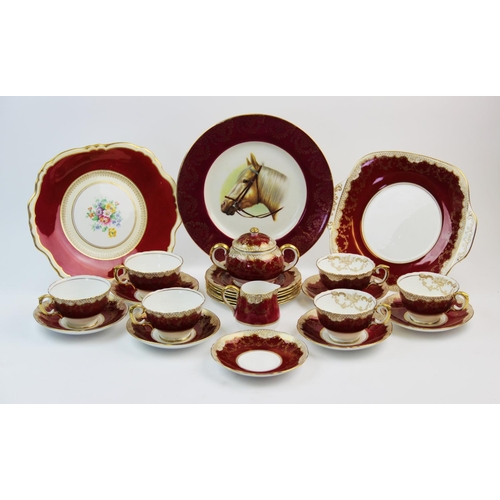 502 - A Crown Staffordshire tea service, late 19th century, comprising: six tea cups (one at fault), seven... 