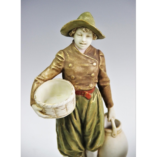 512 - An Ernst Wahliss porcelain figurine, late 19th/early 20th century, modelled as a flower boy holding ... 