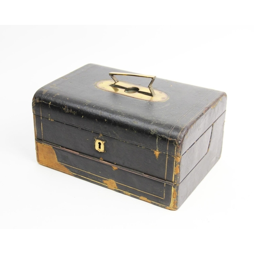 518 - A Victorian gentleman's travelling vanity case, 19th century, the leather bound case with inset fold... 