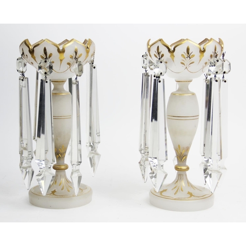 519 - A pair of late 19th/early 20th century glass lustres, of typical form, with recurrent ogee form bord... 