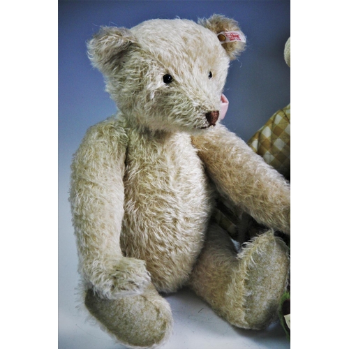 598 - A late 20th century Steiff growler teddy bear, 45cm, a limited edition Hermann teddy, 45cm, a Deans ... 