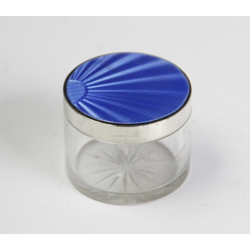 67 - A silver and blue enamel topped dressing table jar, Goldsmiths & Silversmiths Birmingham 1934, of su... 