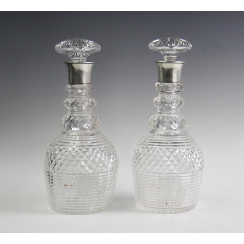 68 - A pair of silver mounted hob nail cut glass decanters and stoppers, John Grinsell and Sons, Birmingh... 