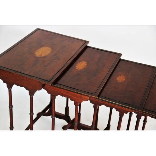 759 - An Edwardian quartetto of mahogany tables, each centred with an oval satinwood fan within a rosewood... 