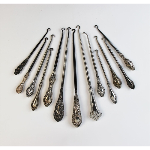 90 - A selection of silver and white metal handled button hooks, Victorian and later (13)