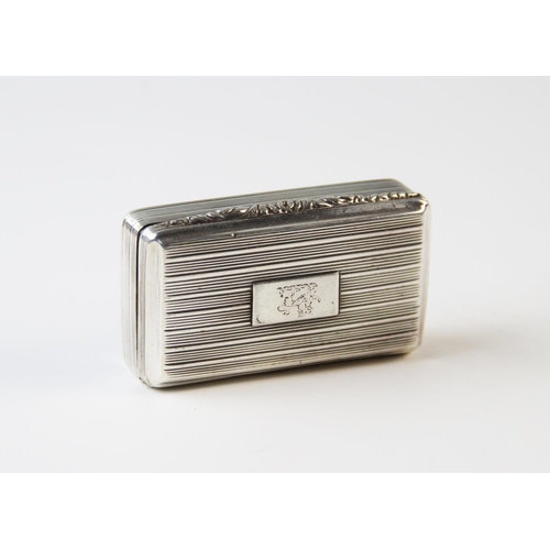 101 - A George IV silver snuff box, 'TS' Birmingham 1829, the rectangular box with striped decoration and ... 